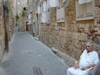 Man in Passage way in the Old Town Area of Saida